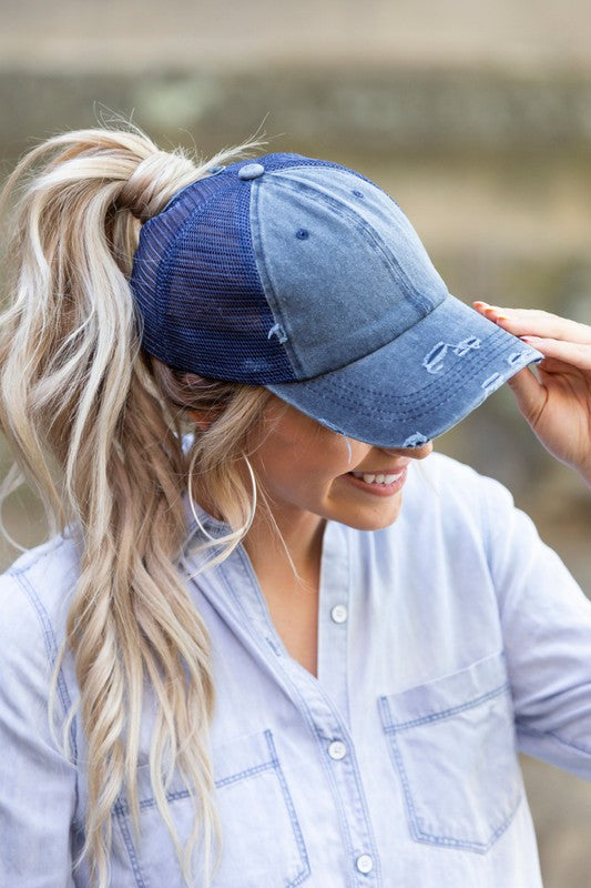 DISTRESSED MESSY BUN HAT