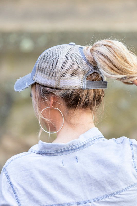 DISTRESSED MESSY BUN HAT